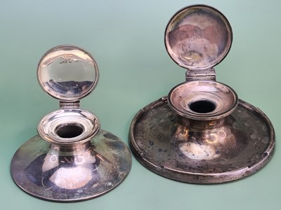 Lot 1441 - Two silver capstan inkwells, Birmingham 1907...