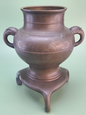 Lot 1450 - A Chinese silver wire inlaid bronze two...