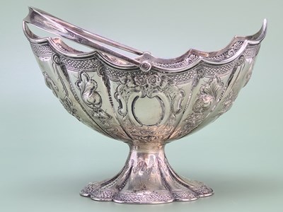 Lot 1451 - A Victorian silver navette shaped sugar basket,...