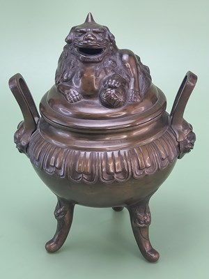 Lot 1453 - A Chinese bronze censer, the cover cast as a...