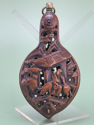 Lot 1454 - A Chinese pierced and carved wood flattened...