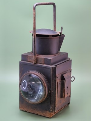 Lot 1493 - A paraffin powered mast lantern with two clear...