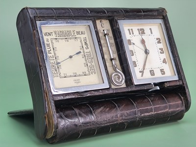 Lot 1817 - An Art Deco weather station travel clock. by...