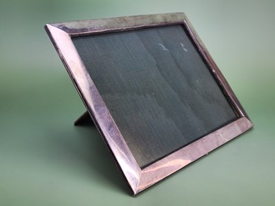 Lot 1822 - A hallmarked silver desk top photograph frame...