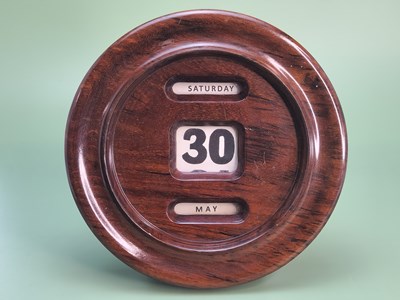 Lot 1783 - A vintage rosewood and walnut perpetual wall...