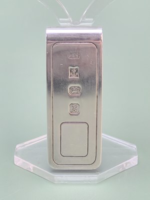Lot 1831 - A hallmarked silver money clip, Birmingham...