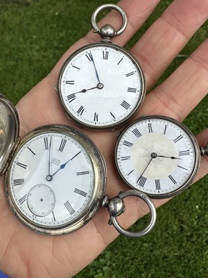Lot 1062 - A group of three silver pocket watches, each...