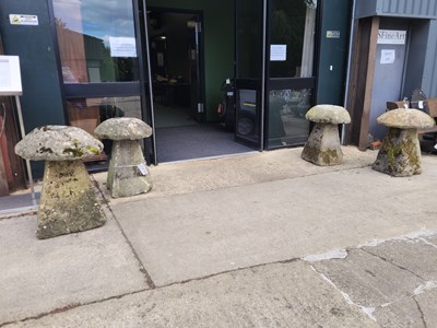 Lot 450 - Four weathered staddle stones with tops,...