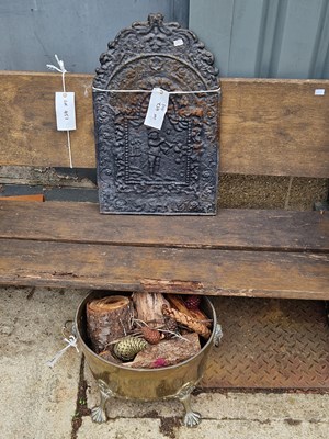Lot 452 - A cast iron fire back  65 × 40cm, together...