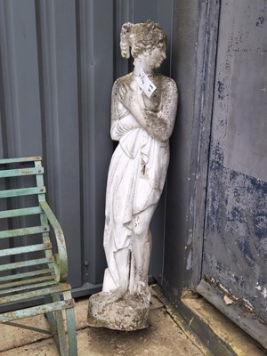 Lot 455 - A concrete figure depicting a lady gazing into...