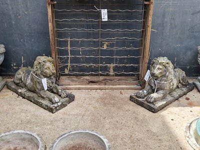 Lot 458 - A pair of weathered concrete lions H 48 W 34 D...