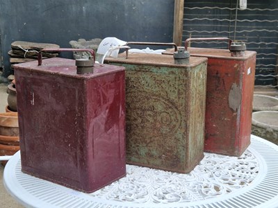 Lot 464 - A trio of vintage metal fuel cans with lids,...
