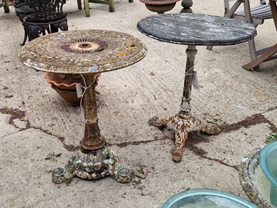 Lot 469 - Two cast iron base garden tables, each H 75 Ø...