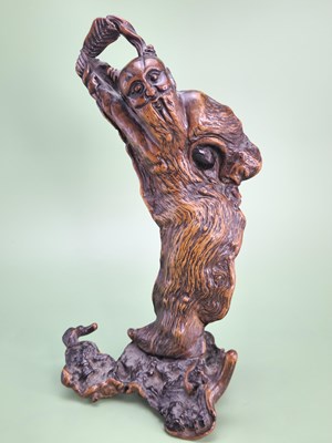 Lot 1841 - An antique Chinese root wood carving of a...