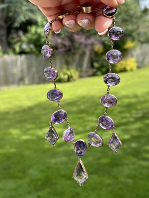 Lot 1088 - An antique amethyst necklace, composed of a...