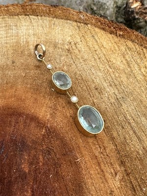 Lot 1051 - An antique pendant of articulated design, set...