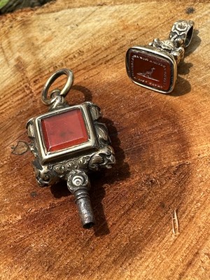 Lot 1060 - An antique group comprising: an intaglio seal...