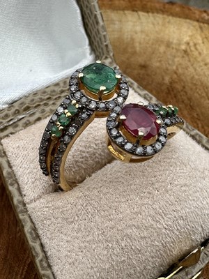 Lot 1094 - A silver gilt twist ring set with a...