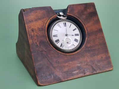 Lot 1850 - An early desktop pocket watch stand, the...