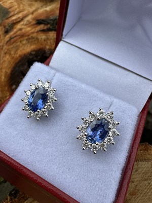 Lot 1124 - A pair of 18ct hallmarked white gold oval...