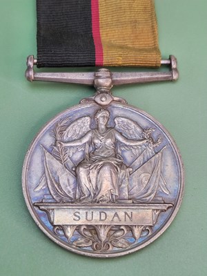 Lot 1321 - A group of medals: a Victorian British Queen's...