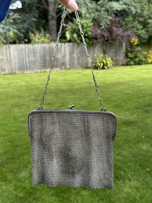 Lot 1120 - A hallmarked sterling silver chainmail purse,...