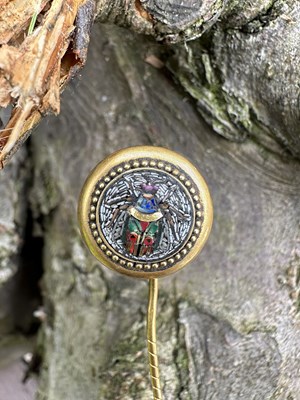 Lot 1182 - An antique micro-mosaic stick pin, the...