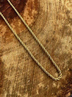 Lot 1166 - A solid rope-link chain necklace of twisted...