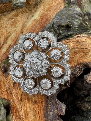 Lot 1165 - An antique diamond cluster brooch/pendant of...