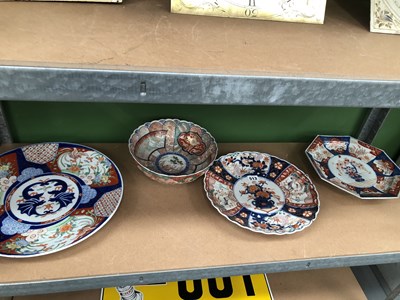 Lot 513 - Three Japanese Imari dishes together with a bowl