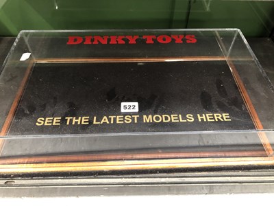 Lot 522 - Dinky Toys, a table top display case for the...