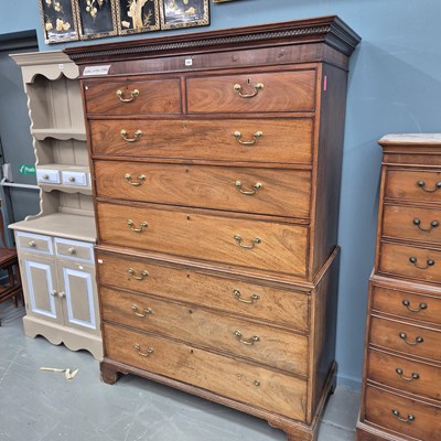 Lot 101 - A Georgian mahogany chest on chest of two over...