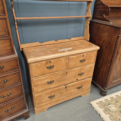 Lot 106 - A small 19th century pine chest of two over...