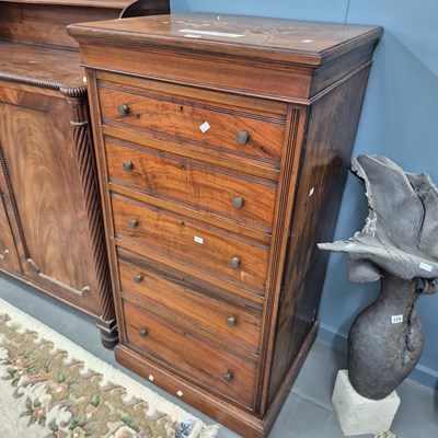 Lot 108 - A mahogany cabinet, the door with five faux...