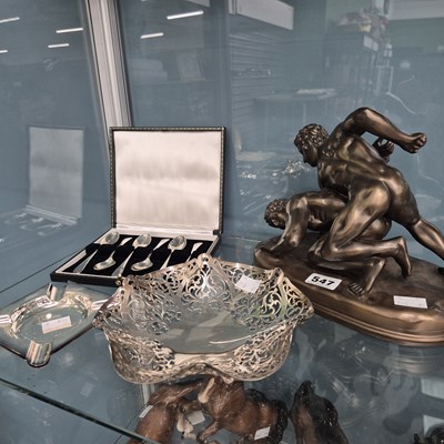Lot 547 - A cold cast bronze wrestler group, a cased set...