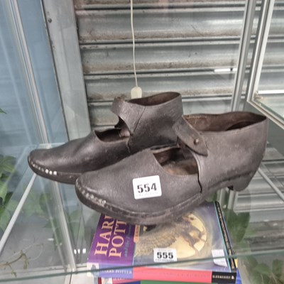 Lot 554 - A pair of Victorian wooden soled clogs