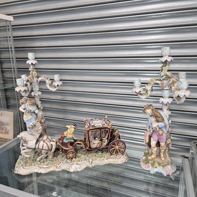 Lot 556 - A pair of German bisque four light figural...