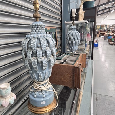 Lot 557 - A pair of lavender glazed baluster table lamps...