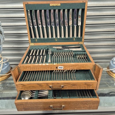 Lot 558 - An oak canteen of approximately twelve place...