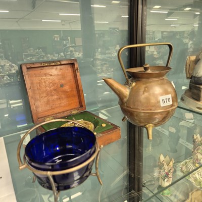Lot 570 - A copper kettle designed by Christopher...