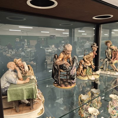 Lot 574 - Four various Capodimonte porcelain groups