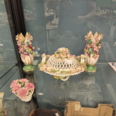 Lot 575 - A pair of floral encrusted tulip shaped vases ,...