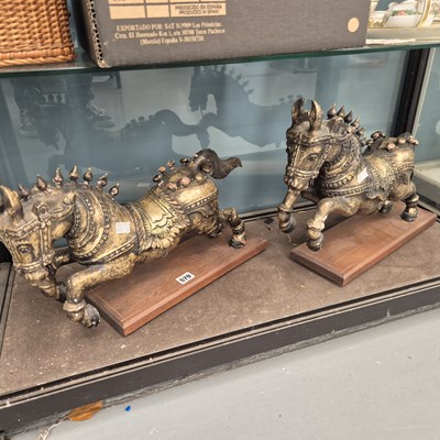 Lot 579 - A pair of Tang style models of horses