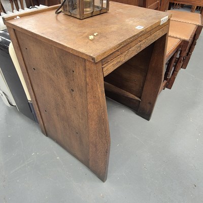 Lot 123 - A small early 20th century oak desk with a...