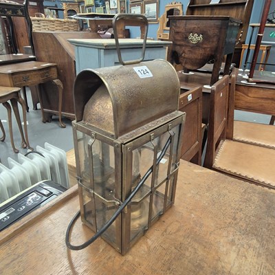 Lot 124 - A metal hand held lantern converted to an...