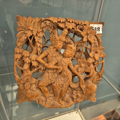 Lot 588 - A Burmese pierced and carved wood pair of...