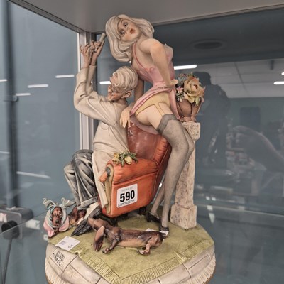 Lot 590 - A Capodimonte doctor and female patient group