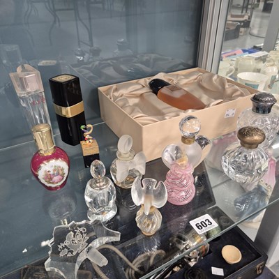 Lot 603 - Two Lalique scent bottles amongst a collection...