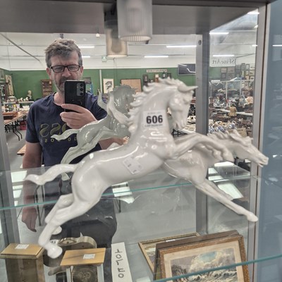 Lot 606 - A Capodimonte white porcelain group of two...