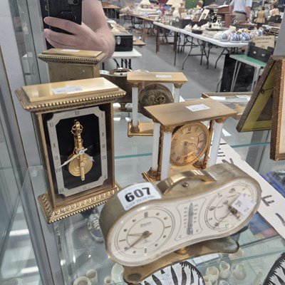 Lot 607 - A Swiza barometer, thermometer and clock in a...